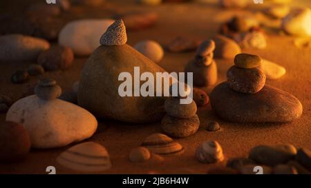 Stone towers on the beach sand at sunrise with golden light and seashells Stock Photo
