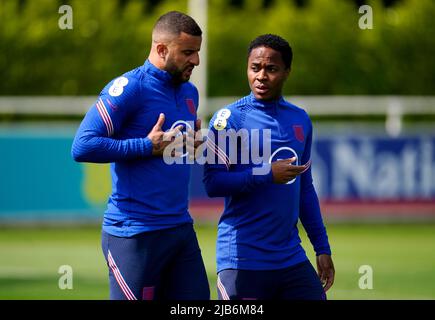 England's Kyle Walker (left) and Raheem Sterling during a training session at St George's Park, Burton-upon-Trent. Picture date: Friday June 3, 2022. Stock Photo