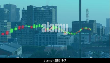 Composite image of glowing financial data processing against cityscape Stock Photo