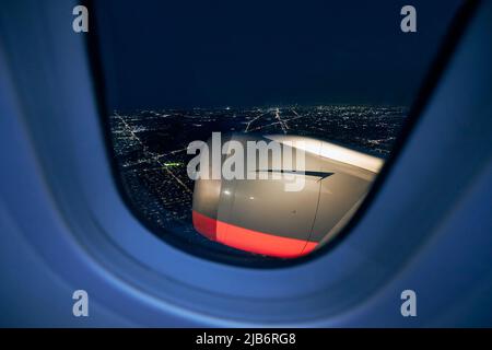 Airplane Window View Of City From Inside Of Airplane Airplane Wing airplane-window-view-of-city-from-inside-of-airplane-airplane-wing
