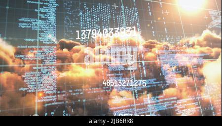 Image of numbers and computer code processing over sunset sky Stock Photo