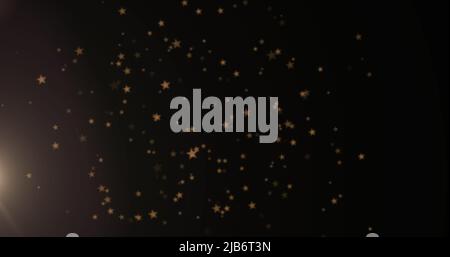 Image of lights and falling stars over black background Stock Photo - Alamy