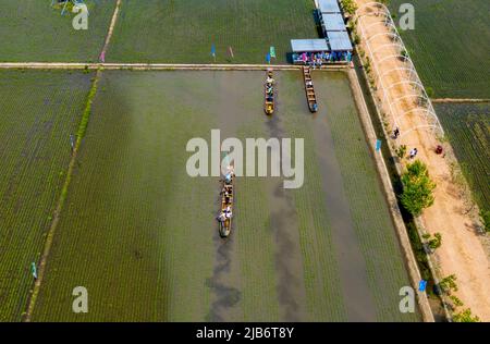 SHENYANG, CHINA - JUNE 3, 2022 - A mud dragon boat race is held at daomeng Space in Shenyang, Liaoning Province, China, June 3, 2022. In the Xibo town Stock Photo