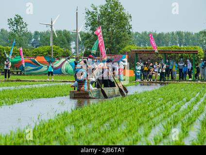 SHENYANG, CHINA - JUNE 3, 2022 - A mud dragon boat race is held at daomeng Space in Shenyang, Liaoning Province, China, June 3, 2022. In the Xibo town Stock Photo