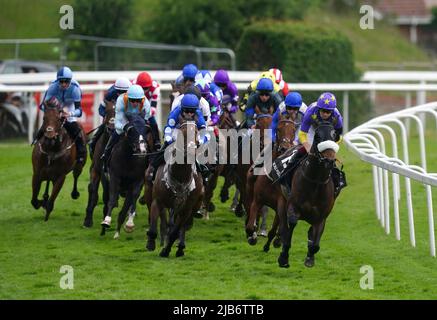 Runners and riders in action during The World Pool Handicap on Ladies Day during the Cazoo Derby Festival 2022 at Epsom Racecourse, Surrey. Picture date: Friday June 3, 2022. Stock Photo