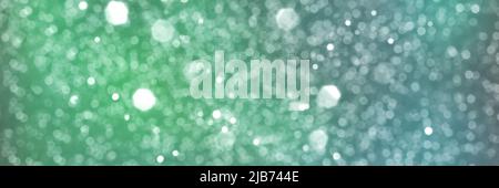 Summer green and blue sparkling glitter bokeh background, banner texture. Abstract defocused lights header. Wide screen wallpaper. Panoramic banner Stock Photo