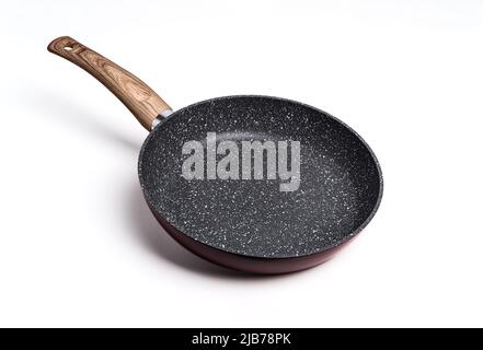 Non stick frying pan isolated on white background. Stock Photo