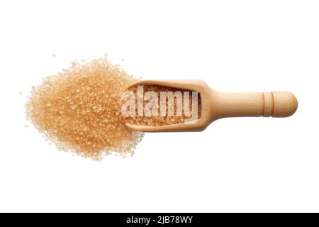 Food ingredients: heap of cane sugar demerara in a wooden scoop, isolated on white background Stock Photo