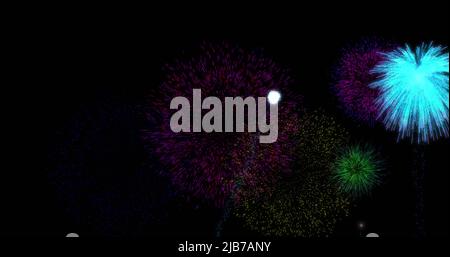 Image of colourful christmas and new year fireworks exploding in night sky Stock Photo