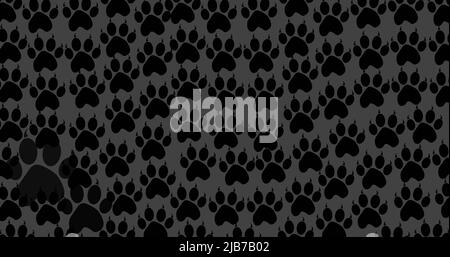 Image of black dog paw prints filling dark grey background Stock Photo