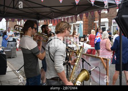 Live music and dancing in a Portsmouth street party for the Queens Platinum Jubilee. Stock Photo