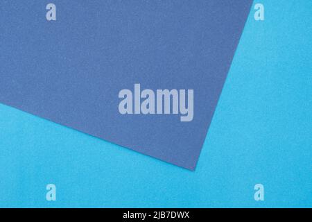 Dark blue and light blue, violet cardboard sheets as mockup, top view, space for text Stock Photo
