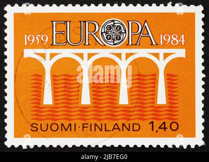 FINLAND - CIRCA 1984: a stamp printed in the Finland shows Bridge over the Sea, Europe, circa 1984 Stock Photo