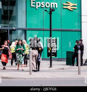 Epson Surrey, London UK, June 03 2022, Crowds Of Fashionable Dressed Racegoers Outside Epsom Railway Station For The Epsom Classic Derby Horse Race Stock Photo