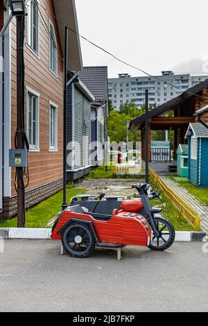 Moscow, Russia - May 28, 2022: wooden model of a motorcycle with a sidecar Stock Photo