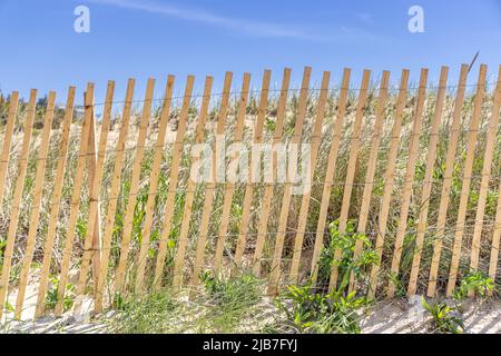 Detail image of beach fencing at a ocean beach Stock Photo