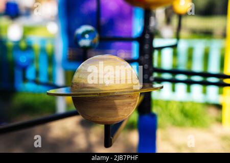 a mock-up of the planet Saturn with a system of rings around it Stock Photo