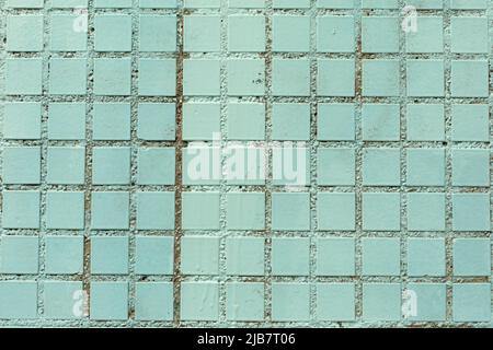 Blue tiles. Texture of tiled wall. Cladding of building. Stock Photo