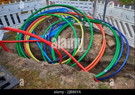 fiber laying for high speed internet construction site Stock Photo