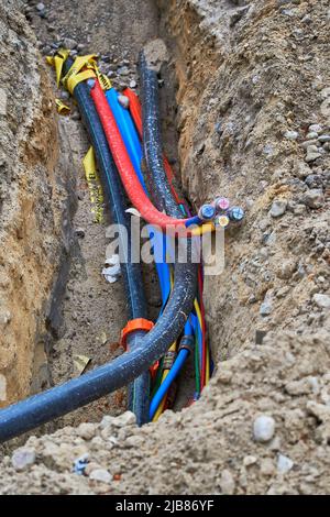 fiber laying for high speed internet construction site Stock Photo