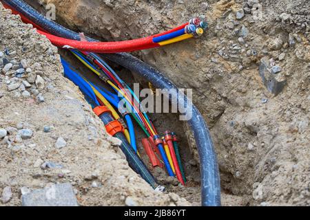 fiber laying for high speed internet construction site Stock Photo