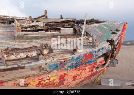 A wooden shipwreck on a beach (crow point, Devon, UK) Stock Photo