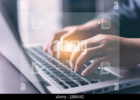 Woman use laptop with cloud computing diagram and virtual cloud technology with icon. Cloud technology management big data include business strategy. Stock Photo