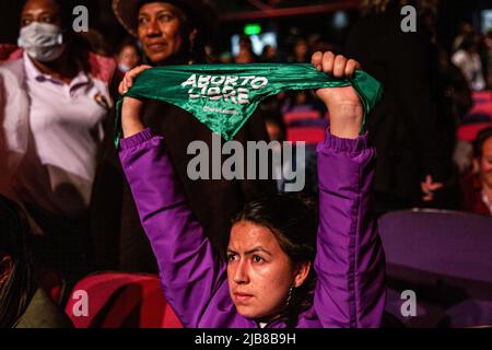 A feminist participant displays the pro-abortion scarf during the debate with feminist and LGBTQ  organisations. A debate with the presidential candidates was held the 2nd of June in Bogotá by more than 30 feminist and LGBTQ  groups. Rodolfo Hernandez, who has been criticized for sexist and misogynistic remarks, did not attend. Candidate Gustavo Petro arrived at the debate late but seemed to be embraced by participants. The change will be feminist or it will not be! (Photo by Antonio Cascio/SOPA Images/Sipa USA) Credit: Sipa USA/Alamy Live News Stock Photo