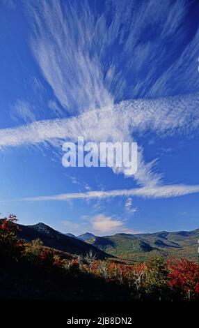 Clouds form contrasting patterns over New Hampshire's White Mountains Stock Photo