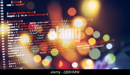 Security code on a computer display, close up. Database bits access stream visualisation. Php language and coding function developer Stock Photo