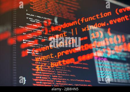 Programming code screen of software developer. Software Programming Work Time. Code text written and created Stock Photo