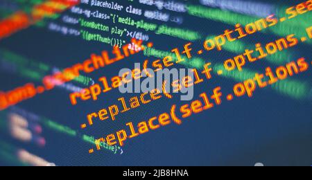Programming code screen of software developer. Software Programming Work Time. Code text written and created Stock Photo