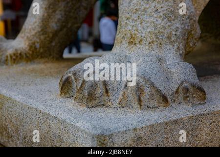 Statue guardian dog at Kanda shrine in Tokyo Stock Photo