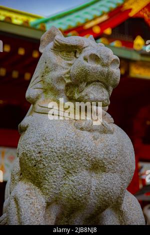 Statue guardian dog at Kanda shrine in Tokyo Stock Photo