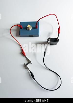 School experiment with electric circuit and a light bulb, physics ...