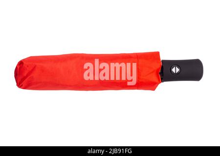 Folded red automatic umbrella isolated on white background. File contains clipping path. Stock Photo