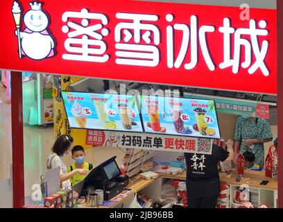 YANTAI, CHINA - JUNE 4, 2022 - People visit a MXBC store at a shopping mall in Yantai, East China's Shandong Province, June 4, 2022. On May 31, 2022, Stock Photo