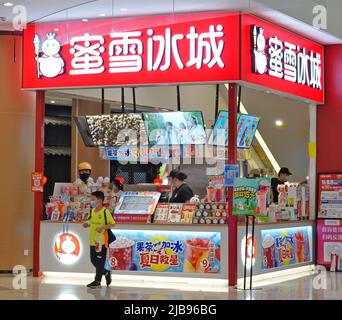 YANTAI, CHINA - JUNE 4, 2022 - People visit a MXBC store at a shopping mall in Yantai, East China's Shandong Province, June 4, 2022. On May 31, 2022, Stock Photo