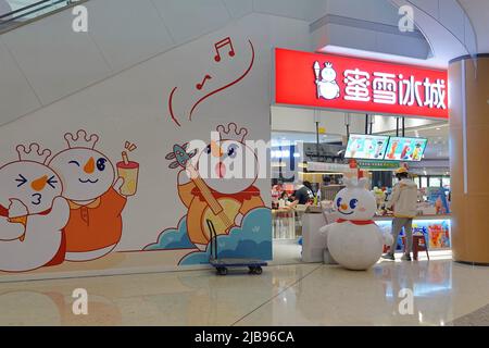 YANTAI, CHINA - JUNE 4, 2022 - People visit a MXBC store at a shopping mall in Yantai, East China's Shandong Province, June 4, 2022. On May 31, 2022, Stock Photo