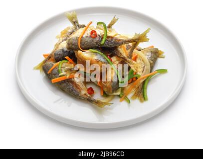 small fish escabeche ( deep fried horse mackerel marinated in spicy vinegar sauce ) Stock Photo