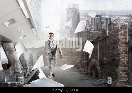 Young businessman walking towards his success in business Stock Photo