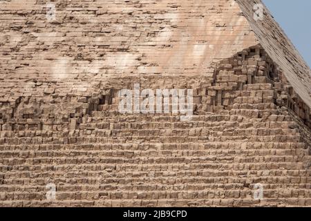 Close up of Limestone casing on peak of Pyramid of Khafre on the Giza plateau, the Great Pyramids of Giza, Cairo, Egypt Stock Photo