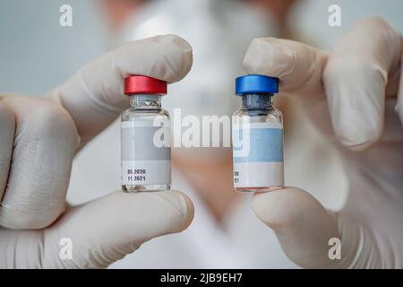 Physician medicine doctor or pharmacist holding or showing bottle in hand and Medical care, pharmacy or health insurance concept