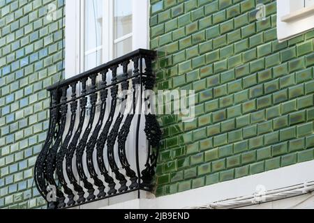 House with green ceramic tiles in Lagos, Algarve, Portugal Stock Photo