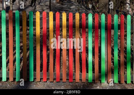 Colourful picket fence Stock Photo