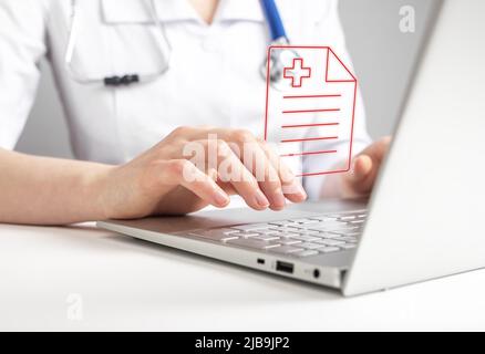 Doctor working with medical document online on laptop, reporting test results or prescription to patient. Records in clinic or telemedicine, telehealth concept. High quality photo Stock Photo