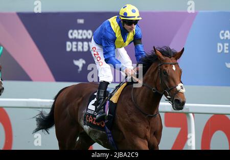 Desert Crown ridden by jockey Richard Kingscote wins the Cazoo Derby (In Memory of Lester Piggott) race on Derby Day during the Cazoo Derby Festival 2022 at Epsom Racecourse, Surrey. Picture date: Saturday June 4, 2022. Stock Photo