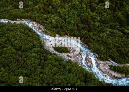 aerial view of a mountain river flowing through the forest Stock Photo
