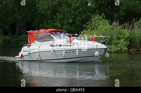 River Cruiser pleasure Craft on the river Ouse in Cambridgeshire Stock Photo