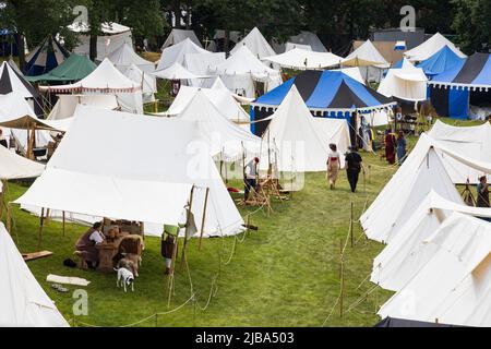 Pfingst-Spektakulum in Muelheim an der Ruhr, Germany. Medieval camp. Event with a medieval knights tournament with camp and crafts market in Müga-Park near Schloss Broich castle. Stock Photo